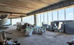 קומה במעטפת בACRO BUSINESS CAMPUS עם חומרי בנייה וחזית מזוגגת - תג נכסים