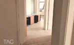 מעבר בין חדרי המשרד להשכרה בבית הטקסטיל בתל אביב - תג נכסים